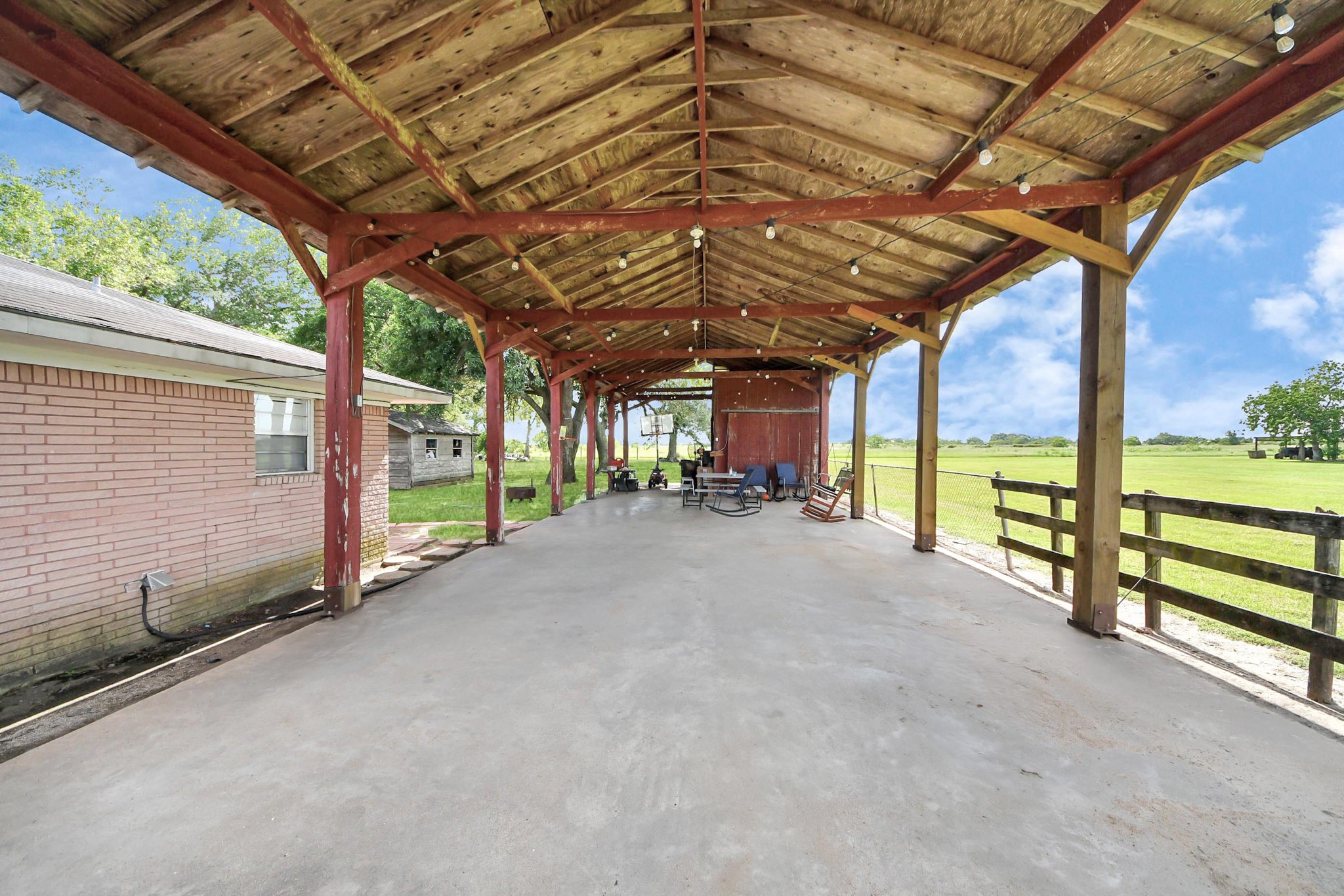 2990 FM 1163 Road El Campo, TX 77437 - Photo 17 of 50 a view of an empty room with a iron stairs