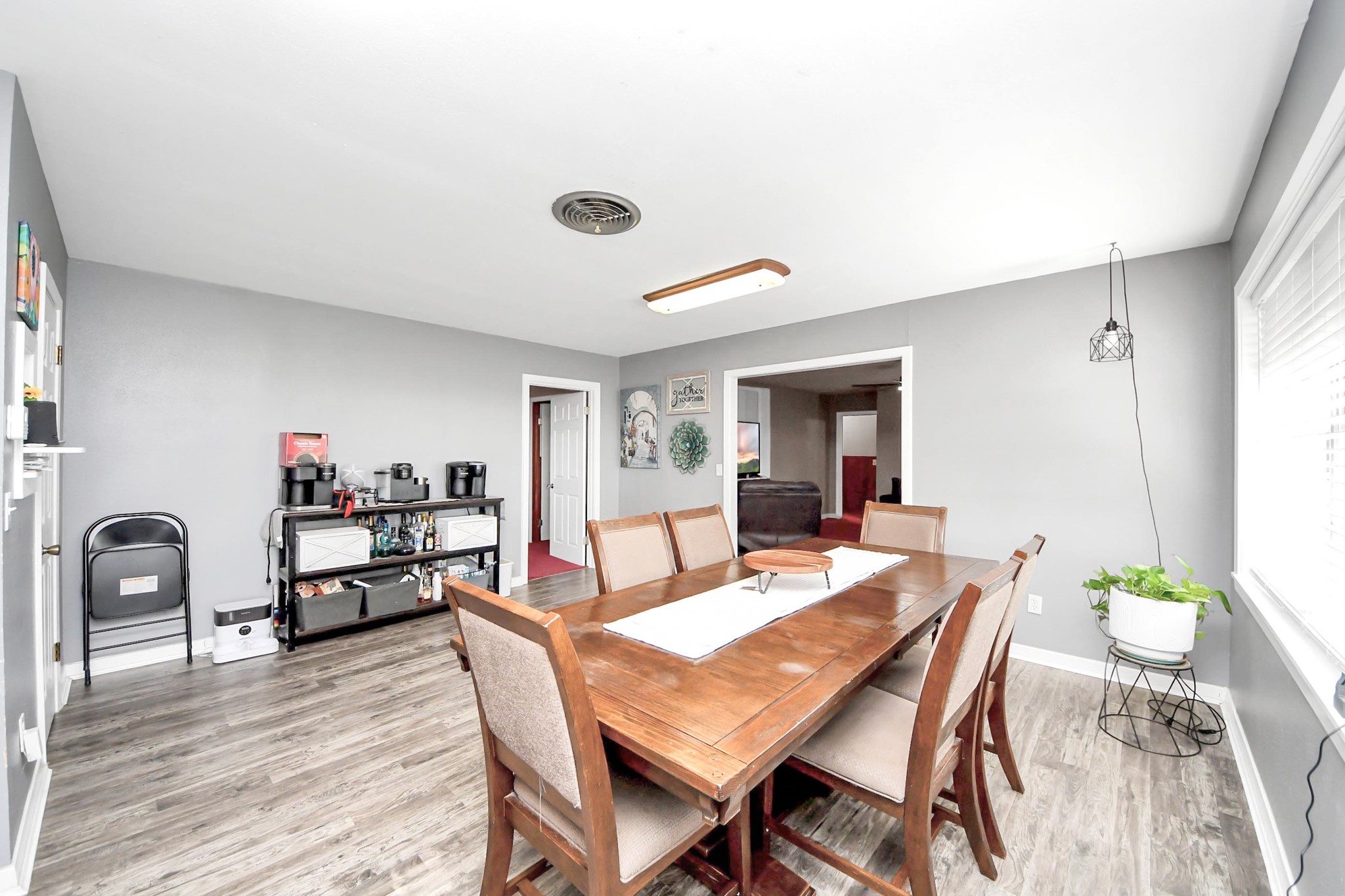 2990 FM 1163 Road El Campo, TX 77437 - Photo 22 of 50 a dining room with furniture and wooden floor