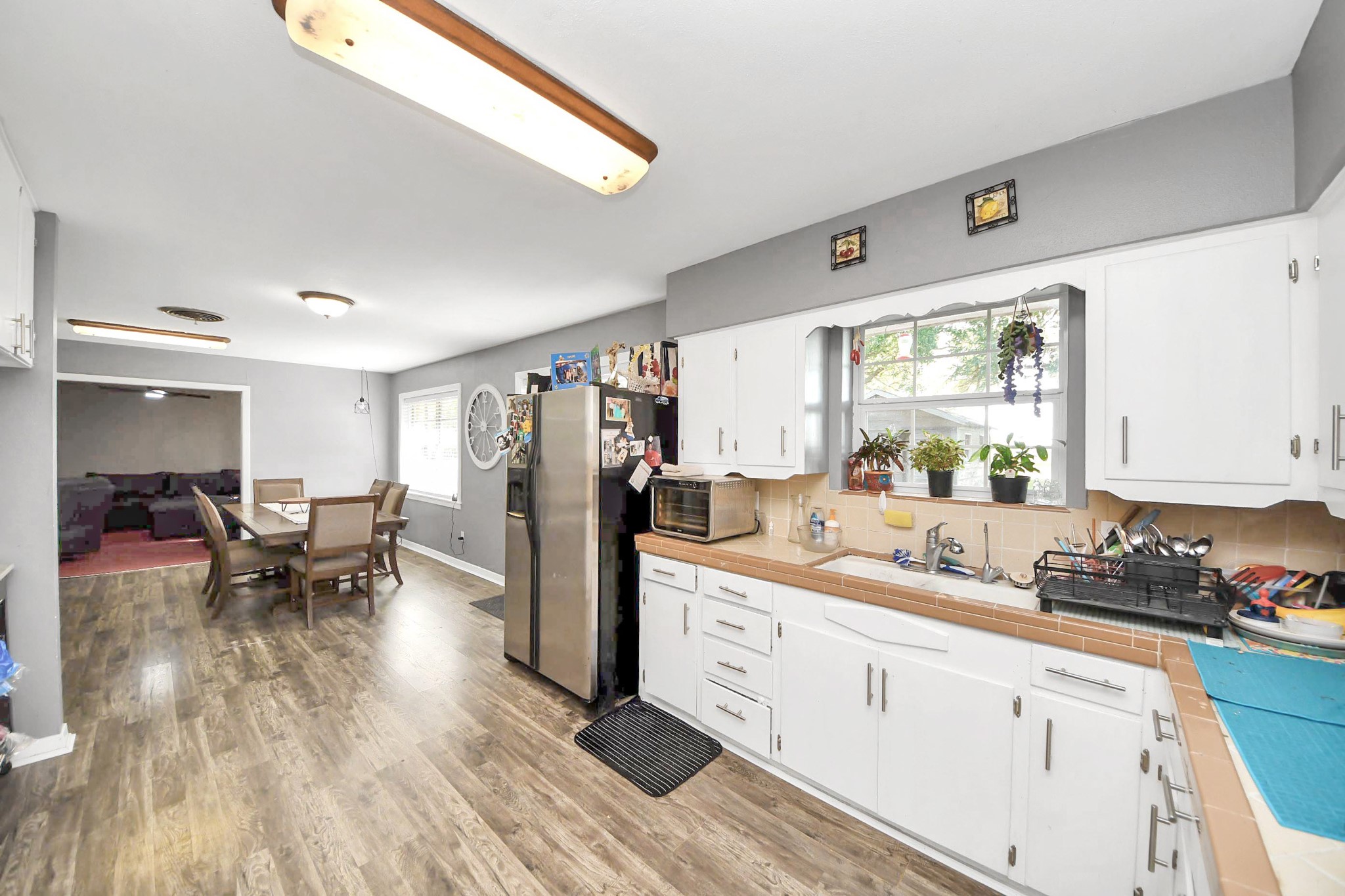 2990 FM 1163 Road El Campo, TX 77437 - Photo 27 of 50 a kitchen that has a lot of cabinets a sink and appliances in it