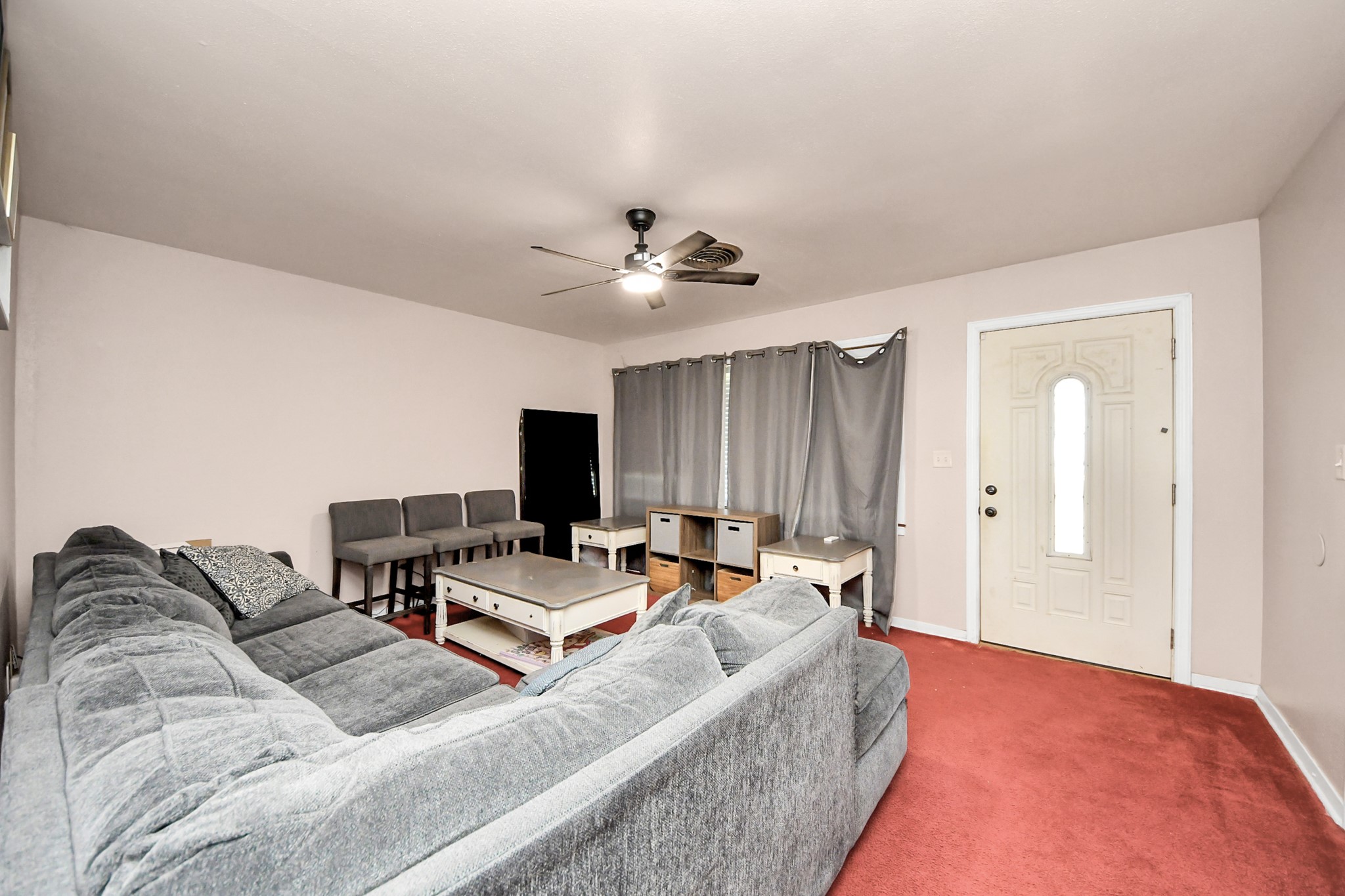 2990 FM 1163 Road El Campo, TX 77437 - Photo 31 of 50 a living room with furniture and a flat screen tv