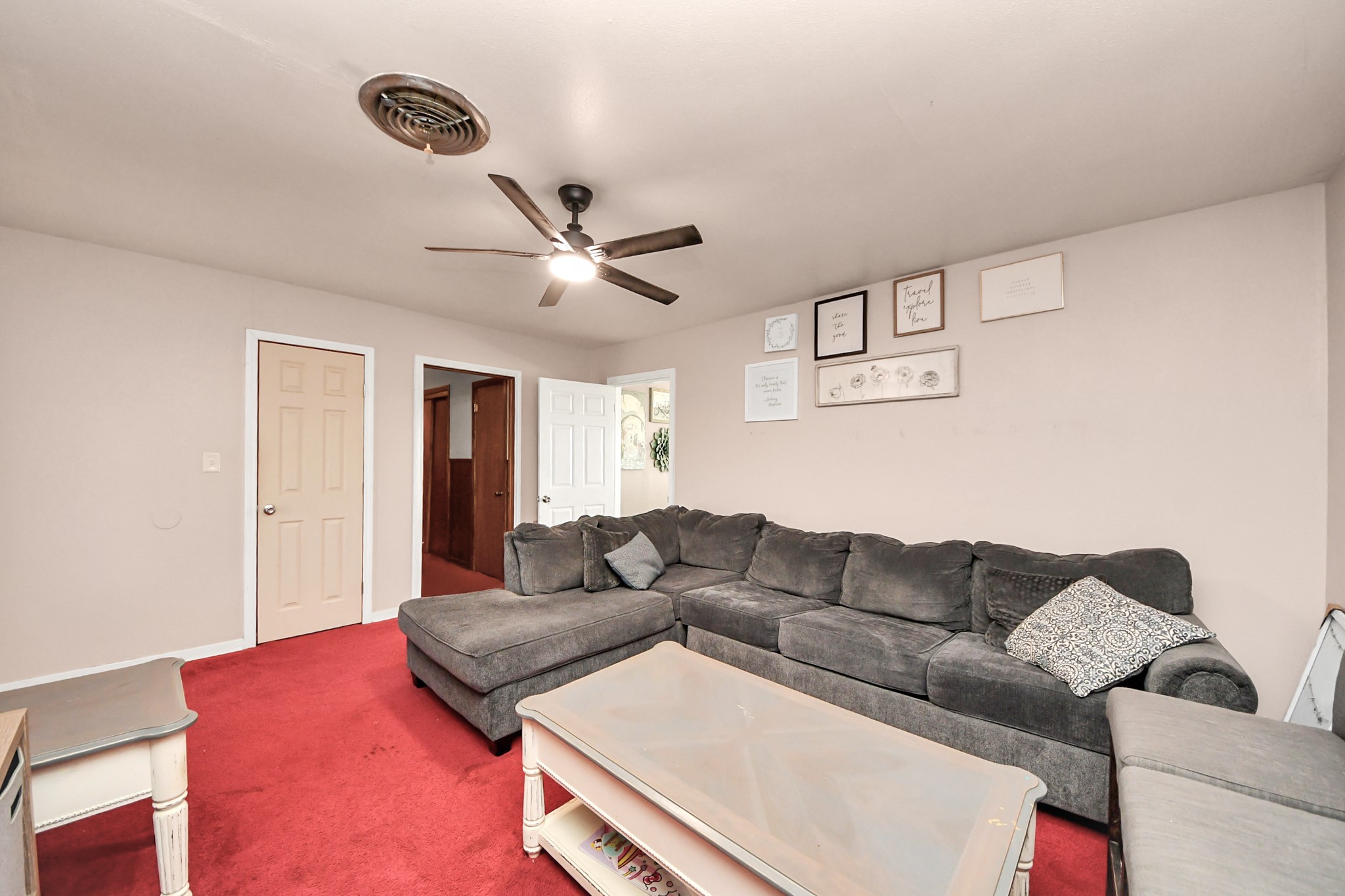 2990 FM 1163 Road El Campo, TX 77437 - Photo 33 of 50 a living room with furniture and a couch