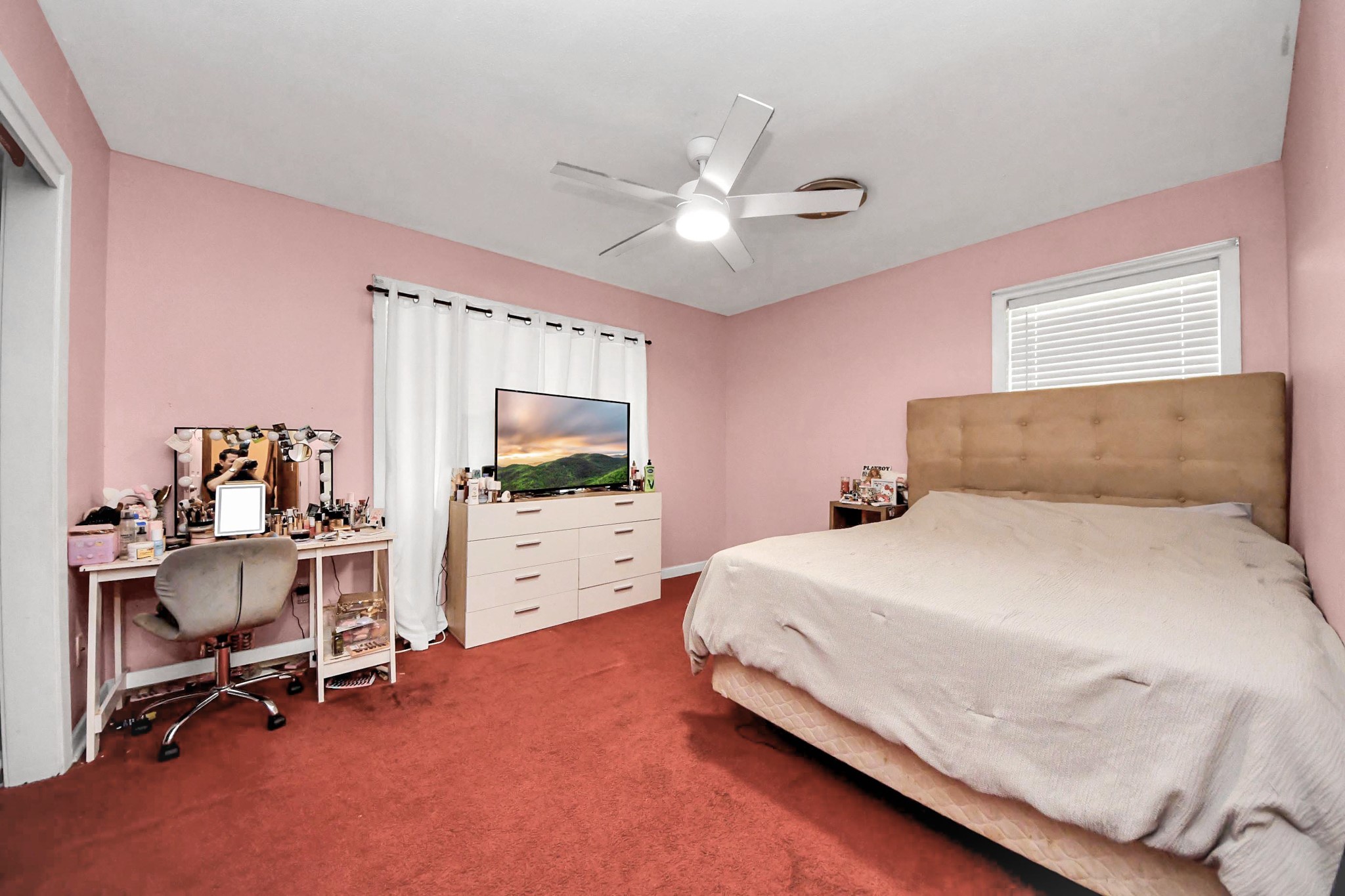 2990 FM 1163 Road El Campo, TX 77437 - Photo 38 of 50 a bedroom with a bed a computer on the desk and chair