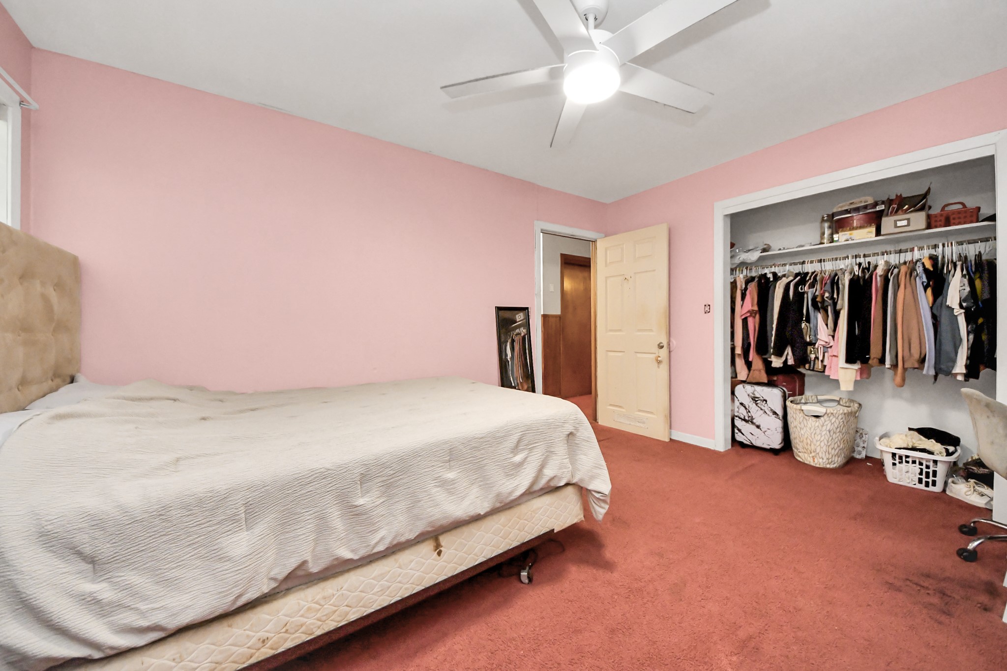 2990 FM 1163 Road El Campo, TX 77437 - Photo 39 of 50 a bedroom with a bed and a walk in closet