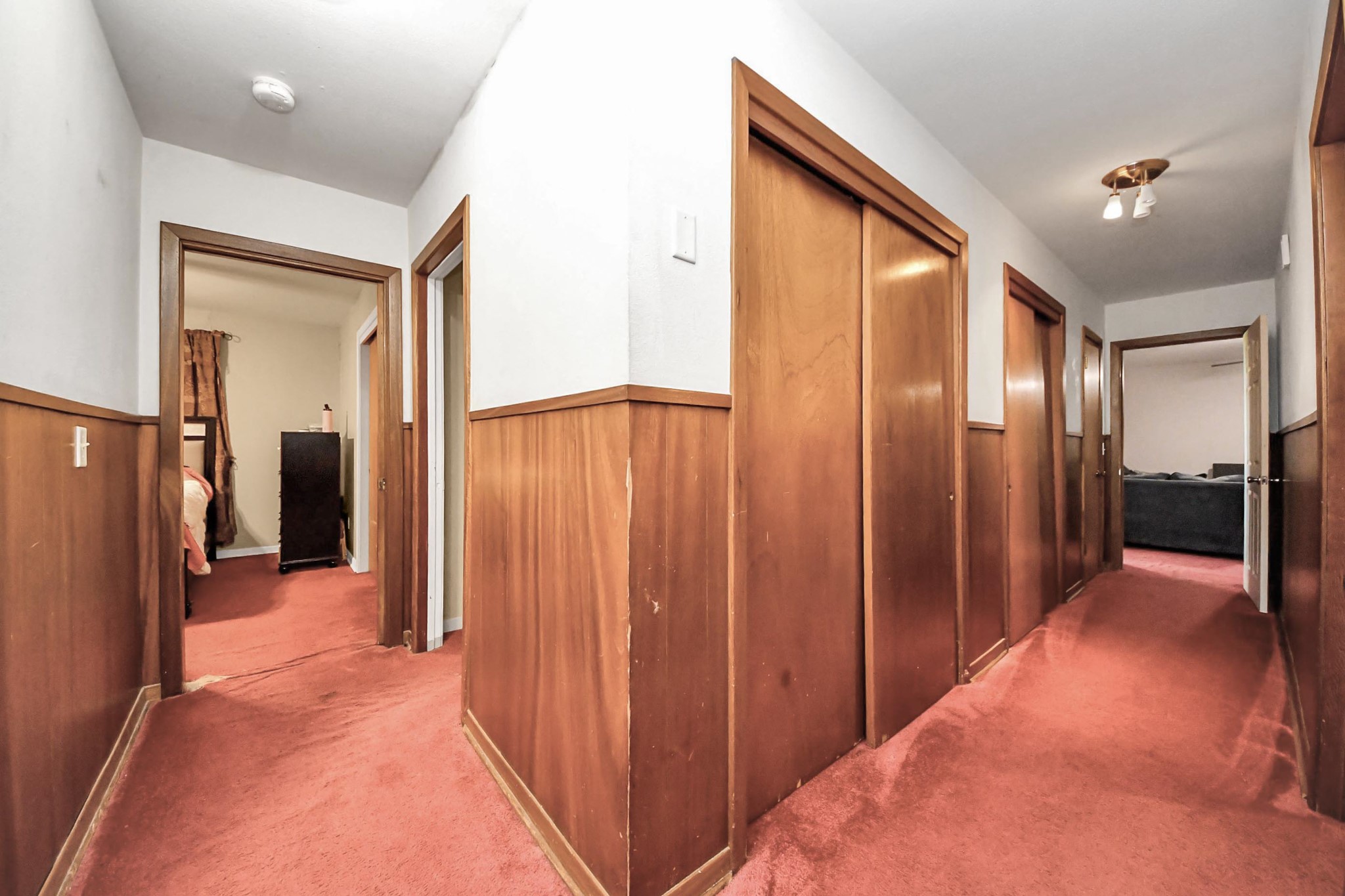 2990 FM 1163 Road El Campo, TX 77437 - Photo 45 of 50 a view of a hallway with wooden cabinets