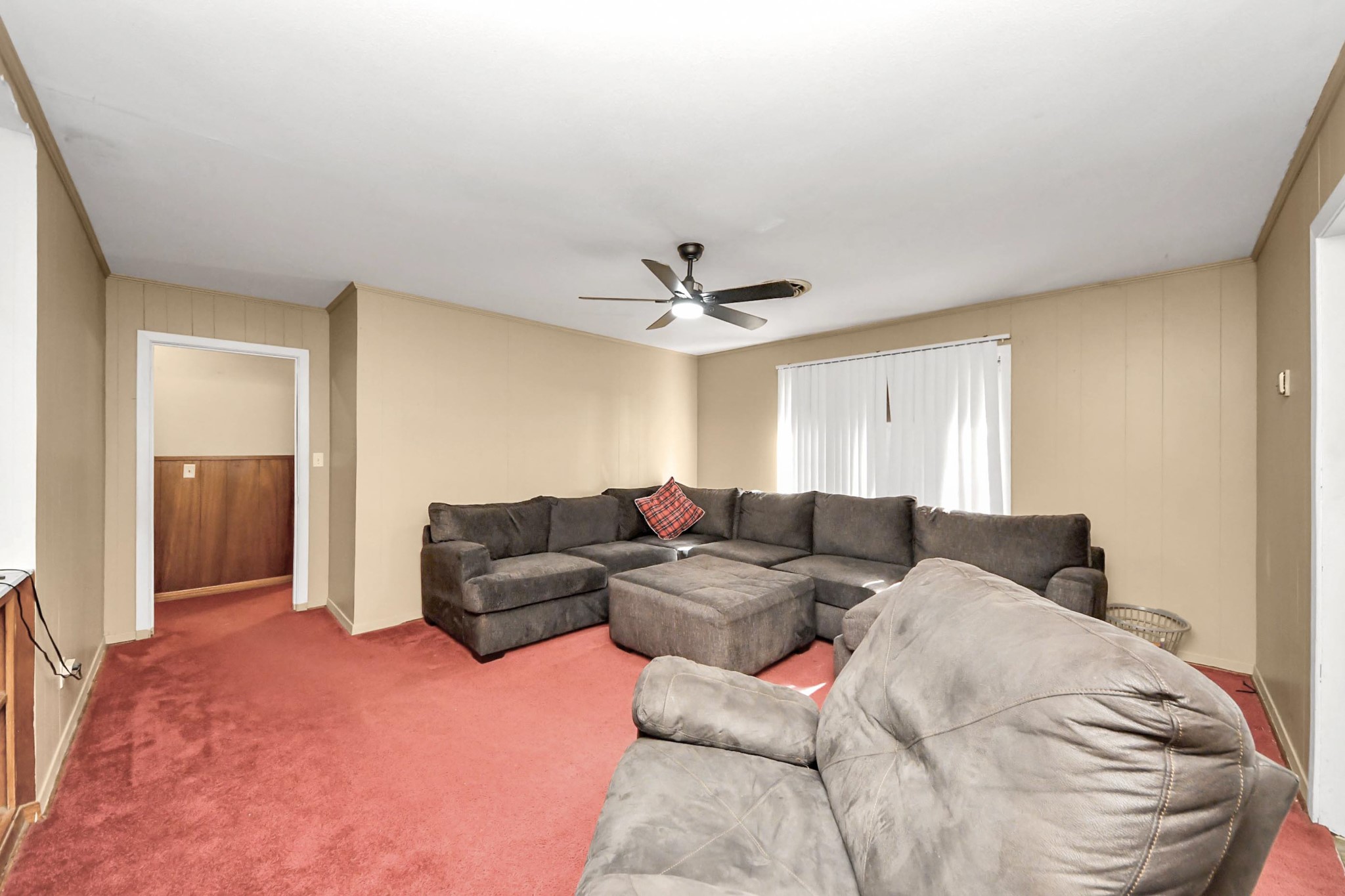2990 FM 1163 Road El Campo, TX 77437 - Photo 48 of 50 a living room with furniture and a ceiling fan