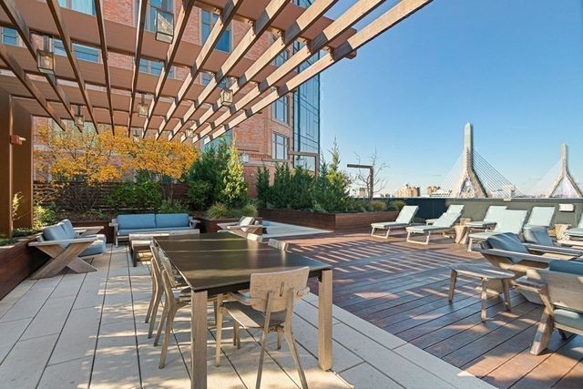 a view of a patio with swimming pool