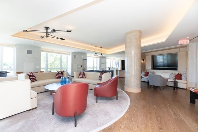 a view of living room with furniture and window