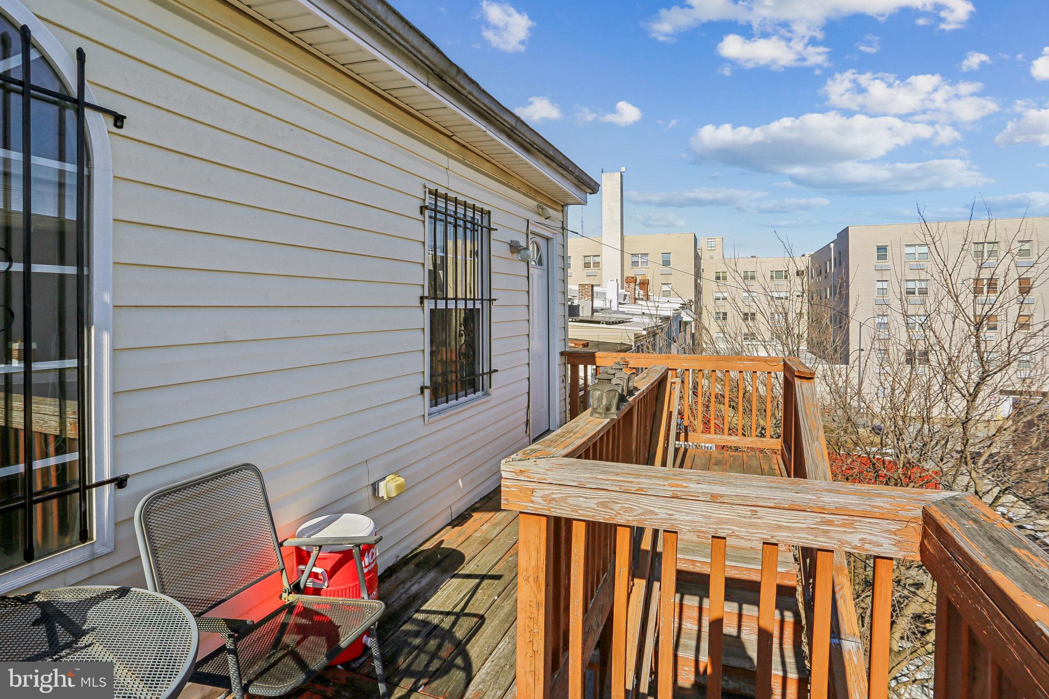 5501 8th Street Northwest, Unit 4 Washington, DC 20011 - Photo 21 of 38 a view of a roof deck with furniture