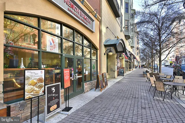 a view of a building with sitting area