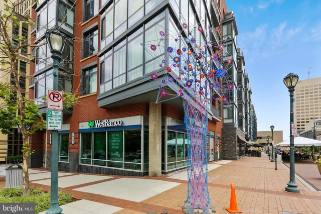 a view of a building with a tree