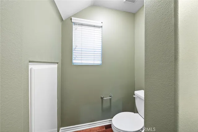 a view of a town with mountains in the background