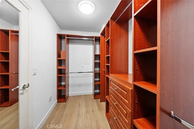 a view of house with patio outdoor seating and green space