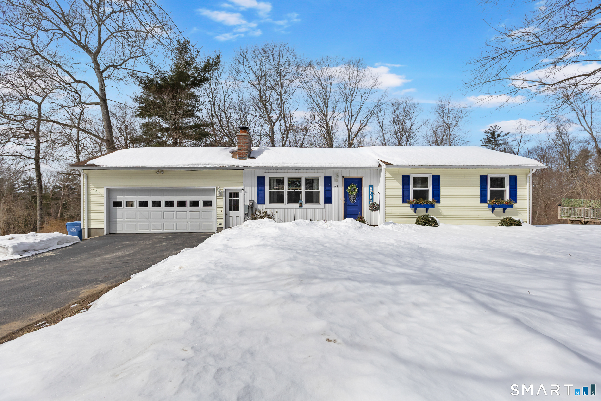 63 Gorman Road Brooklyn, CT 06234 - Photo 1 of 1 a view of a white house with a large tree