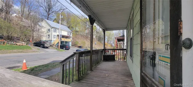 a balcony view with a sink and dishwasher