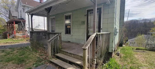 a view of living room kitchen
