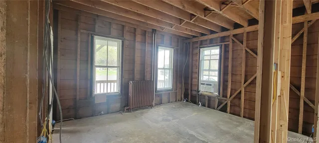 an empty room with windows