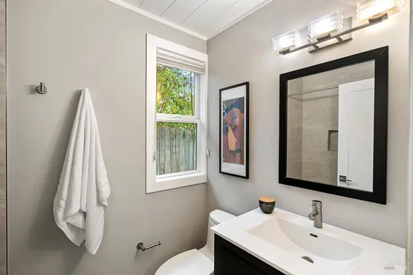 a view of a mountain in the distance in a field