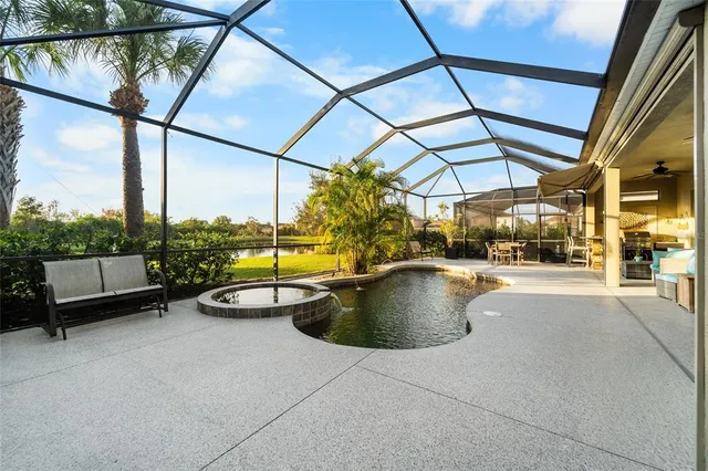a view of patio with swimming pool