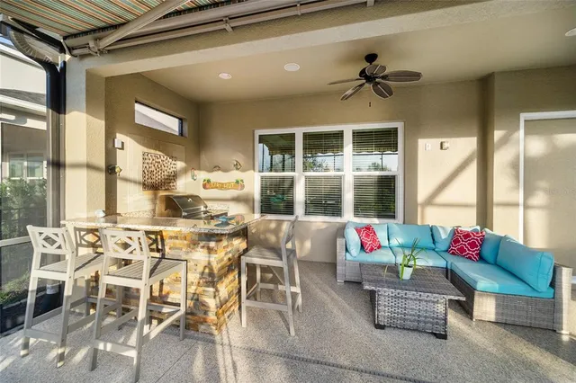 an aerial view of a city with ocean