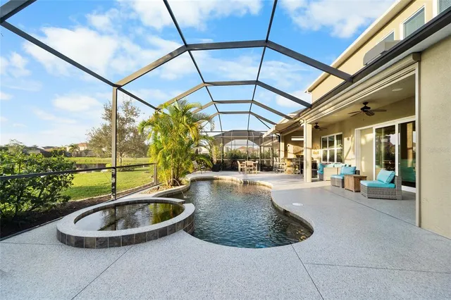 an aerial view of city and lake