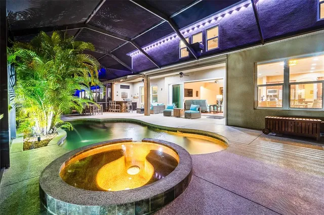 an aerial view of a houses with outdoor space