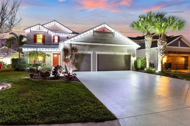 an aerial view of a house with swimming pool