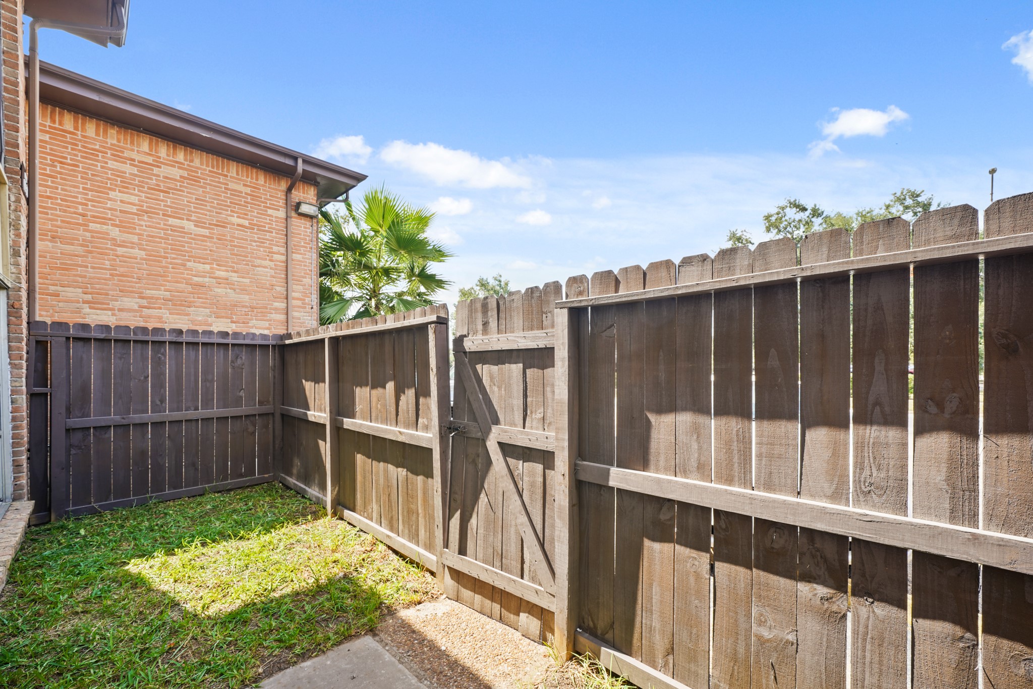 7047 Bissonnet Street, Unit 62 Houston, TX 77074 - Photo 14 of 15 a view of outdoor space with backyard
