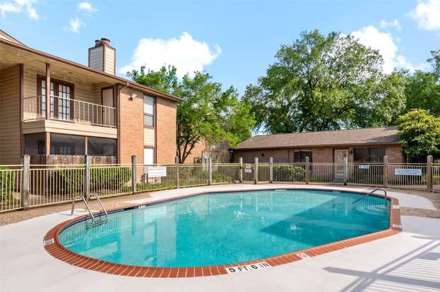7047 Bissonnet Street, Unit 62 Houston, TX 77074 - Photo 15 of 15 a view of a house with a swimming pool
