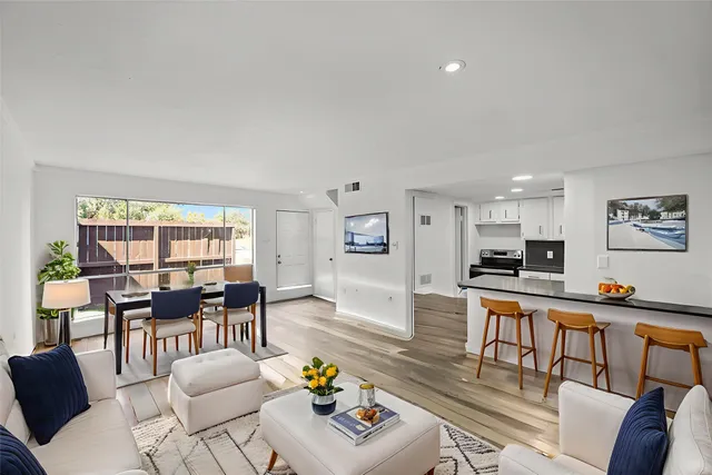 a living room with furniture and a table