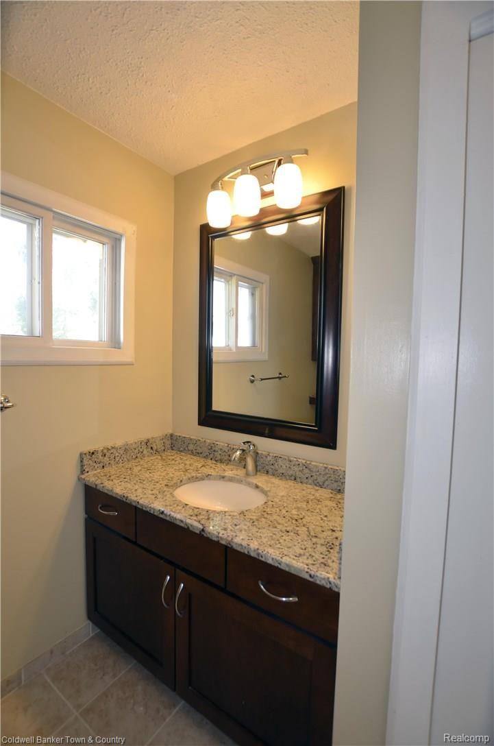 9389 Old Lee Road Brighton, MI 48116 - Photo 12 of 29 Bathrom1.jpg