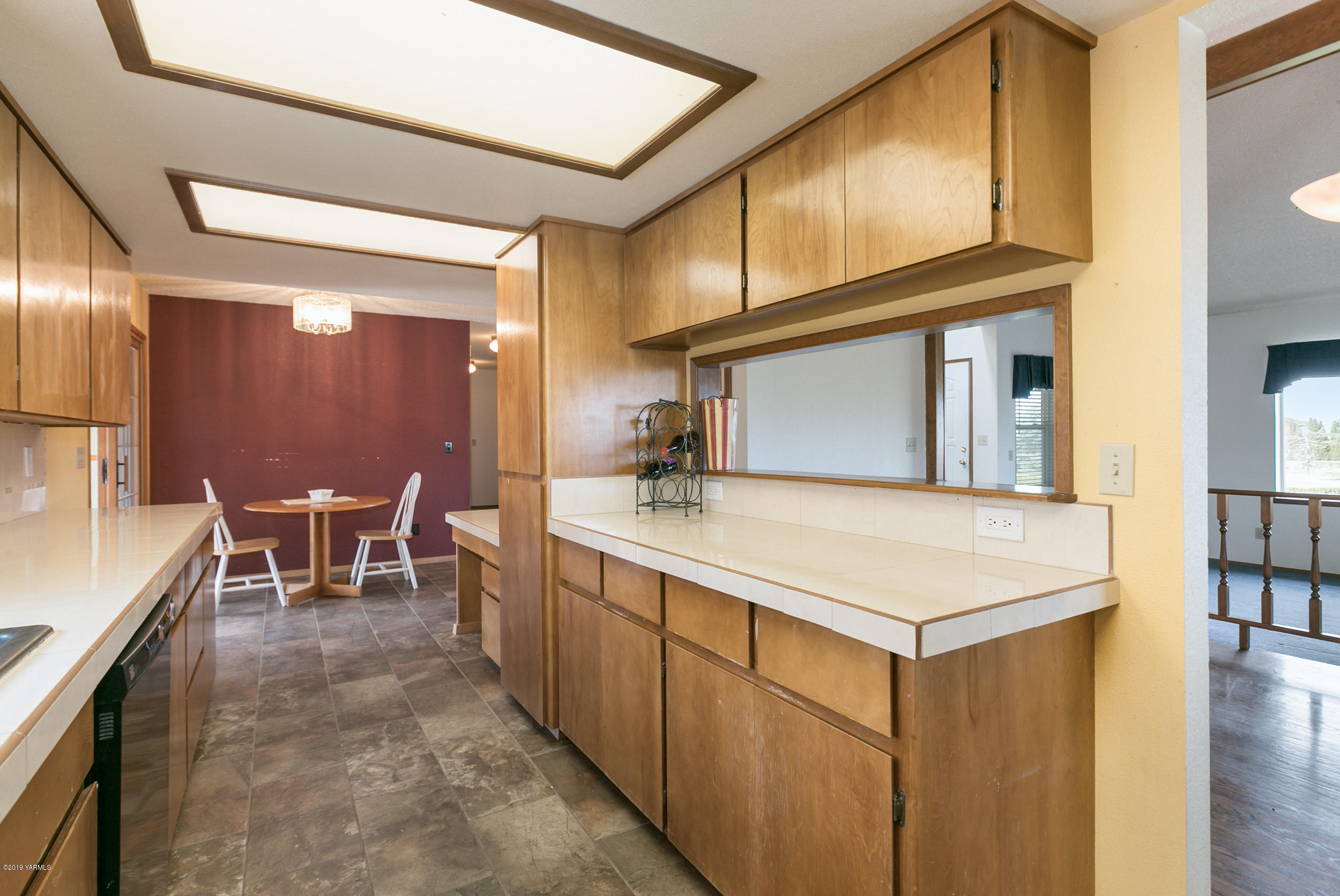 61 Faucher Road Yakima, WA 98901 - Photo 11 of 27 a kitchen with stainless steel appliances a sink and cabinets