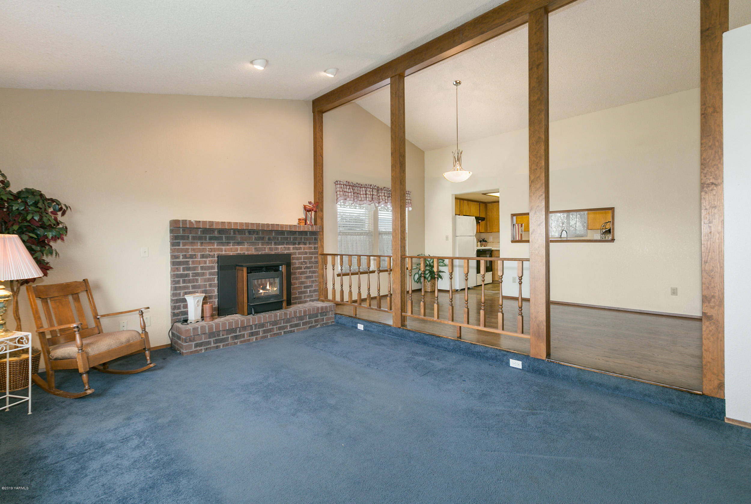 61 Faucher Road Yakima, WA 98901 - Photo 6 of 27 a view of a livingroom with furniture and a fireplace