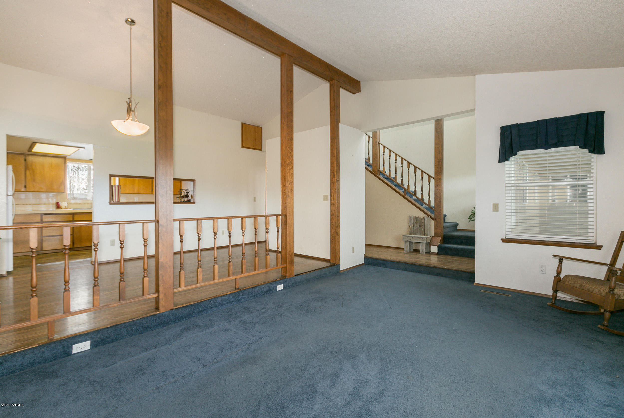 61 Faucher Road Yakima, WA 98901 - Photo 8 of 27 a view of an empty room with stairs