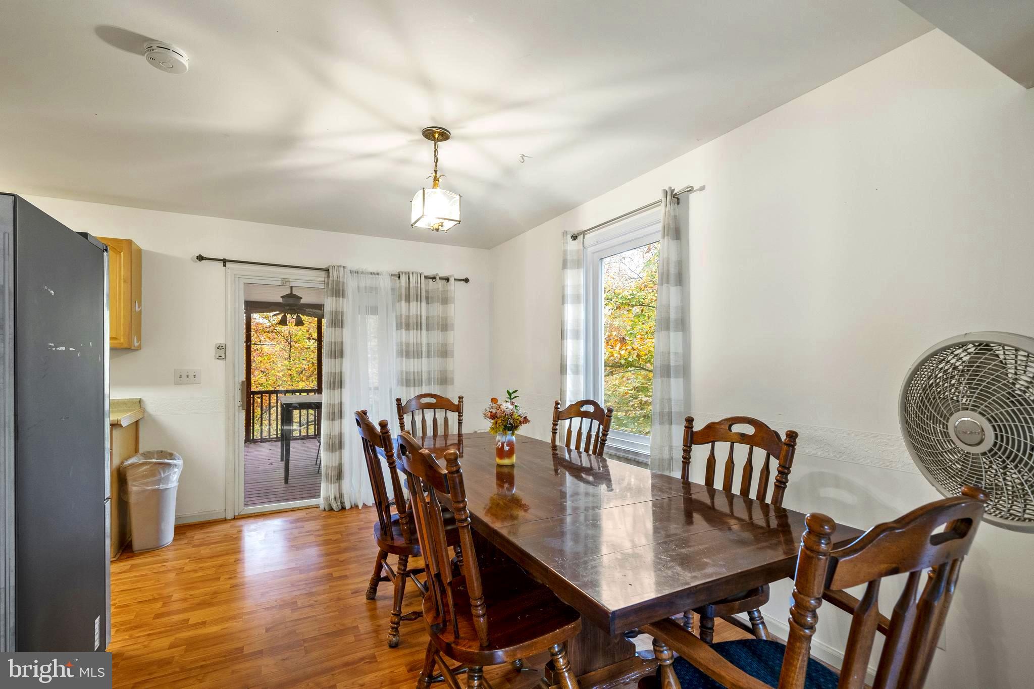 631 San Gabriel Road Lusby, MD 20657 - Photo 12 of 31 Large Dining area with slider to back deck.