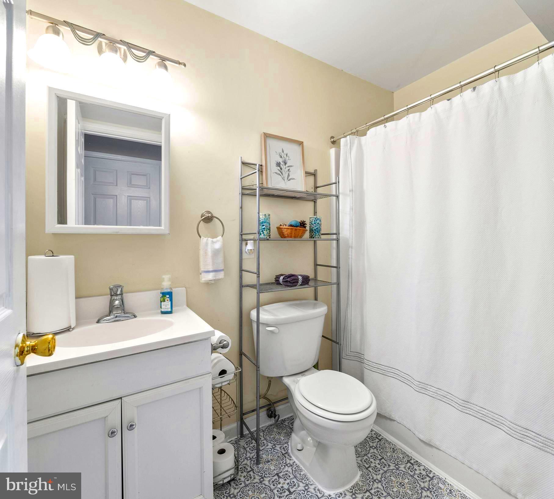 631 San Gabriel Road Lusby, MD 20657 - Photo 19 of 31 Main level bathroom.
