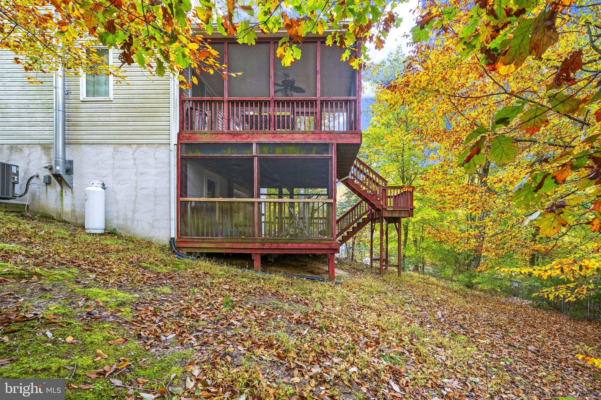 631 San Gabriel Road Lusby, MD 20657 - Photo 4 of 31 Double screened porches to enjoy nature!
