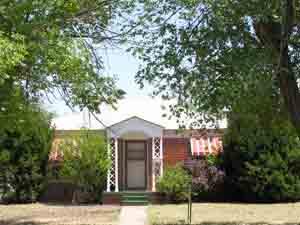 a front view of a house with yard