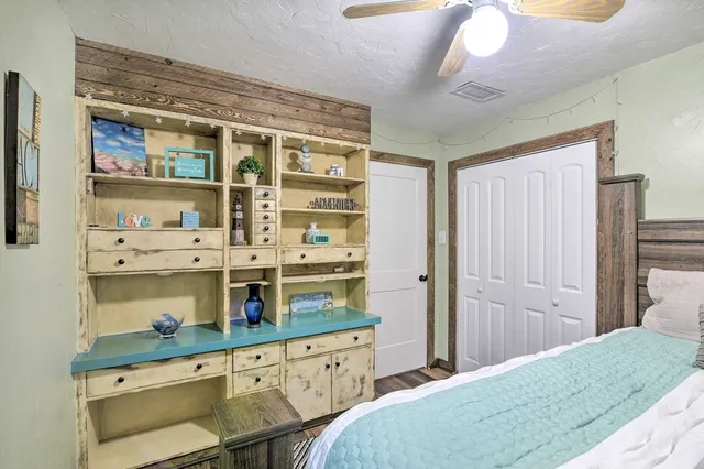 a kitchen with stainless steel appliances a refrigerator and cabinets