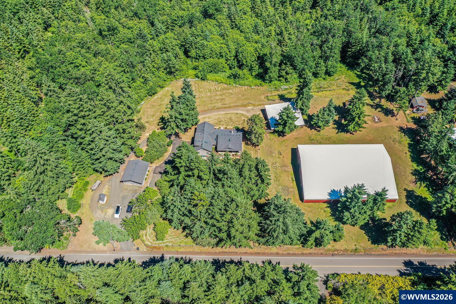 1110 Reuben Boise Road Dallas, OR 97338 - Photo 45 of 49 an aerial view of residential house with outdoor space and trees all around