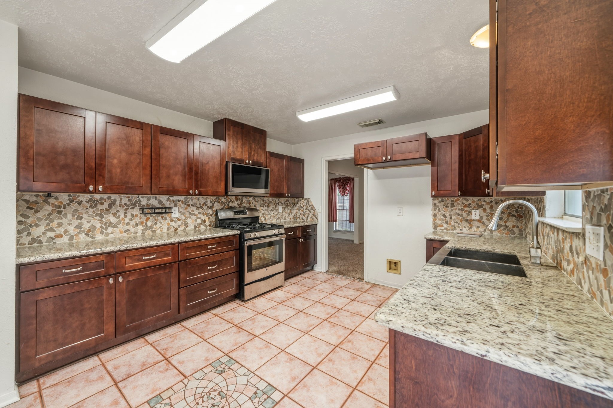 5619 Roserock Lane Spring, TX 77379 - Photo 14 of 45 Plenty of cabinetry space for your dish and partyware.