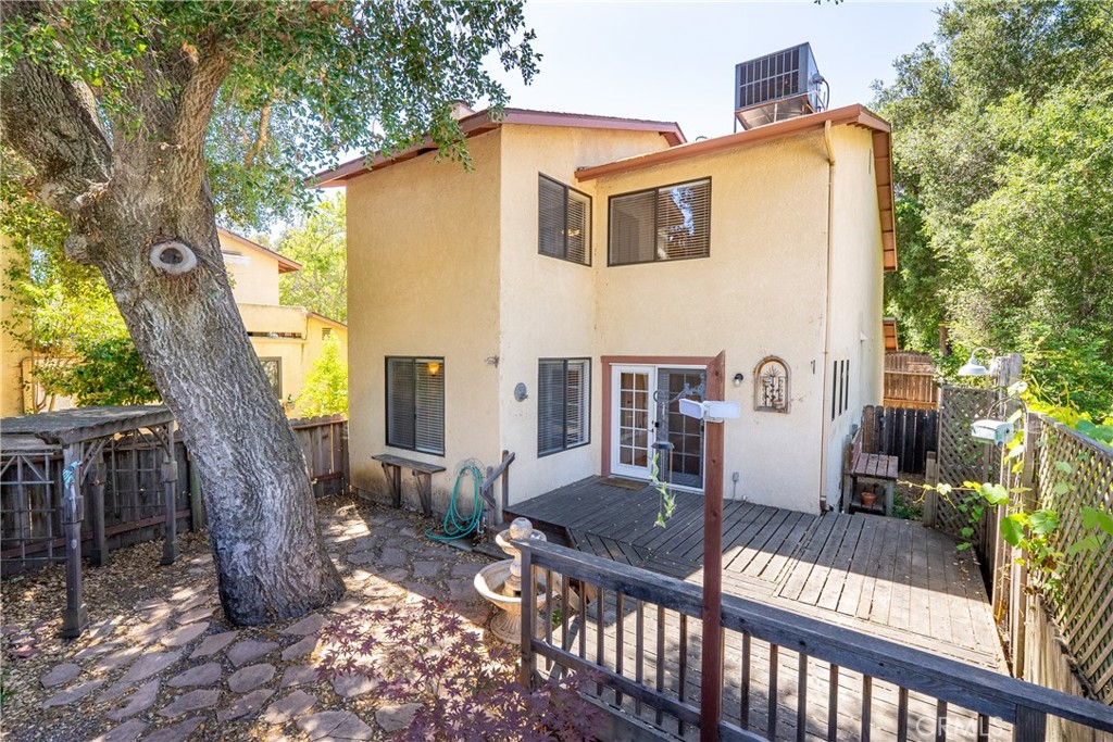 6815 Santa Lucia Road, Unit 5 Atascadero, CA 93422 - Photo 35 of 44 Below the deck is a flagstone patio with pergola.