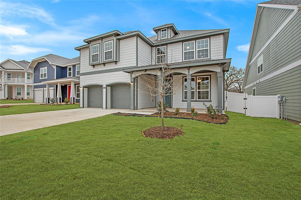 1605 Katharina Avenue Providence Village, TX 76227 - Photo 1 of 35 a front view of a house with a yard