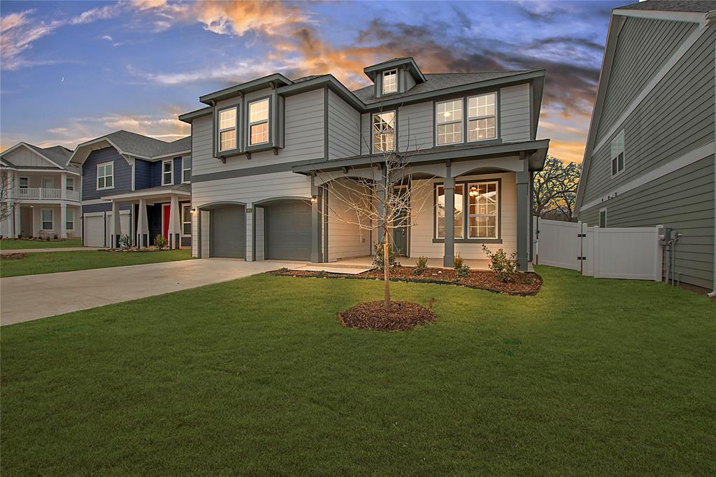 1605 Katharina Avenue Providence Village, TX 76227 - Photo 2 of 35 a front view of a house with a yard
