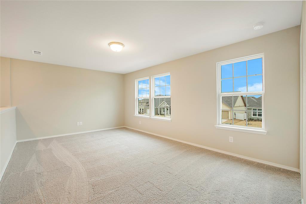 1605 Katharina Avenue Providence Village, TX 76227 - Photo 30 of 35 a view of an empty room with a window