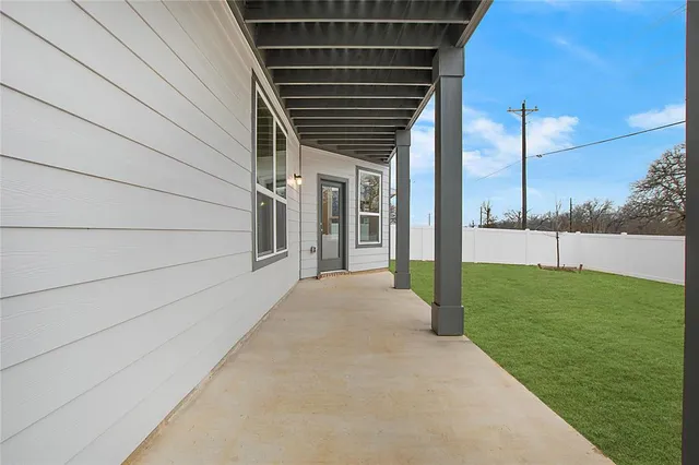 a view of a porch with a backyard