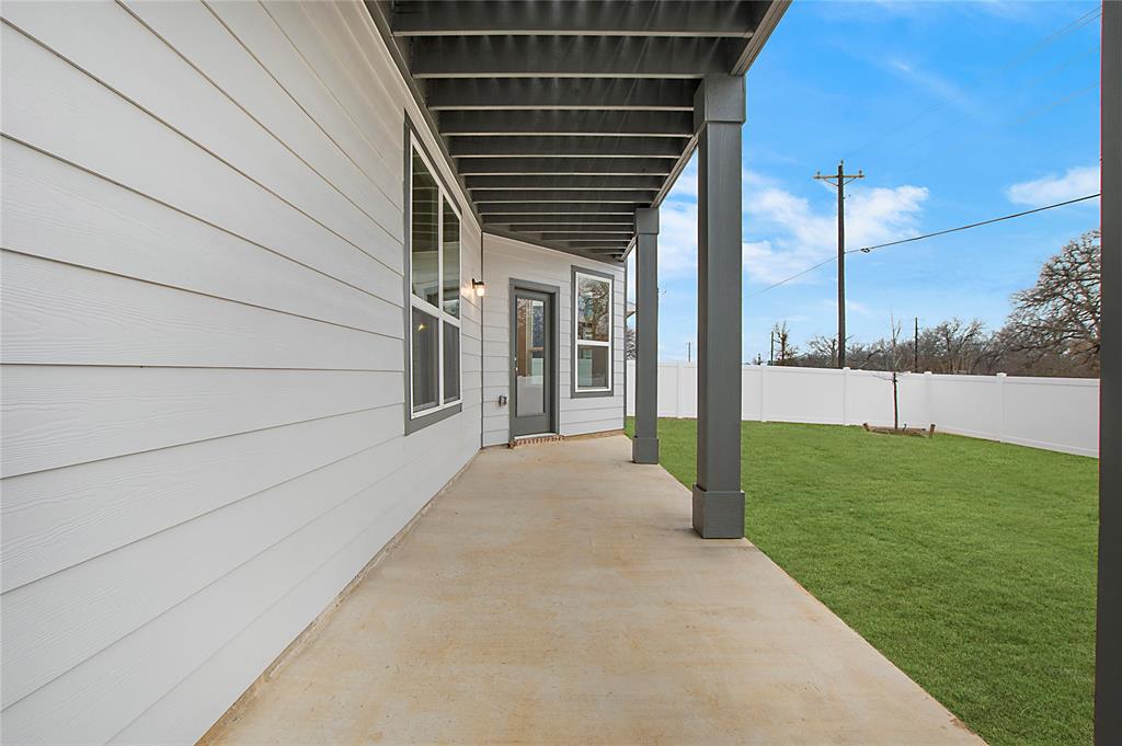 1605 Katharina Avenue Providence Village, TX 76227 - Photo 3 of 35 a view of a porch with a backyard