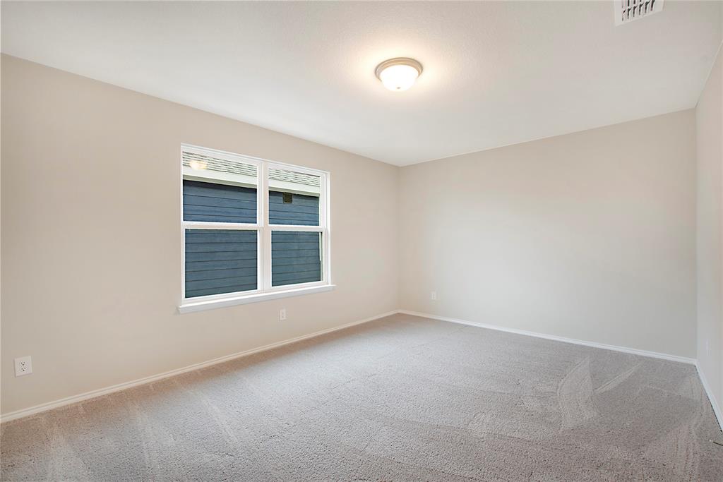 1605 Katharina Avenue Providence Village, TX 76227 - Photo 33 of 35 an empty room with a window