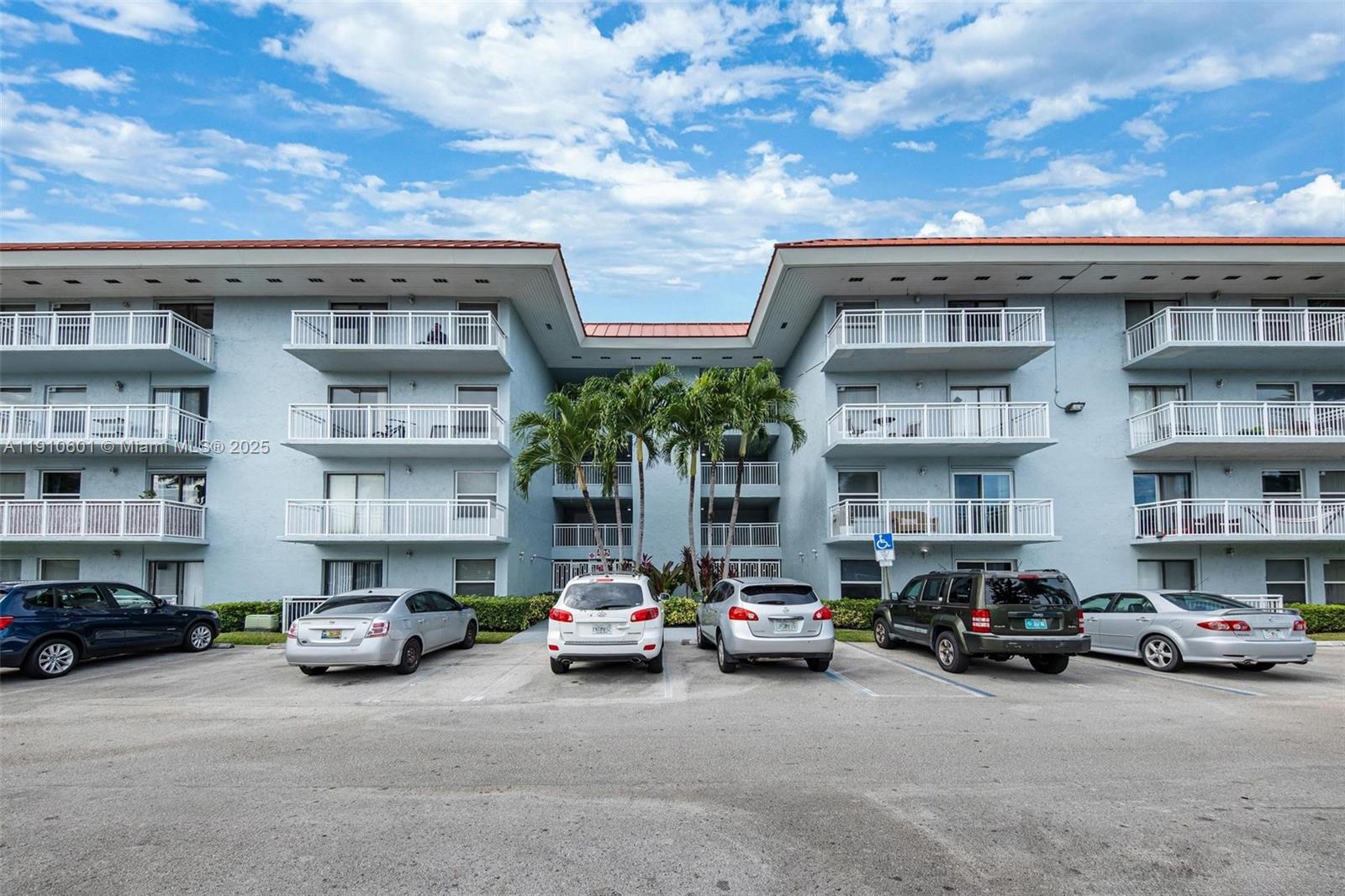 405 South Pine Island Road, Unit 405D Plantation, FL 33324 - Photo 20 of 28 a car parked in front of a building