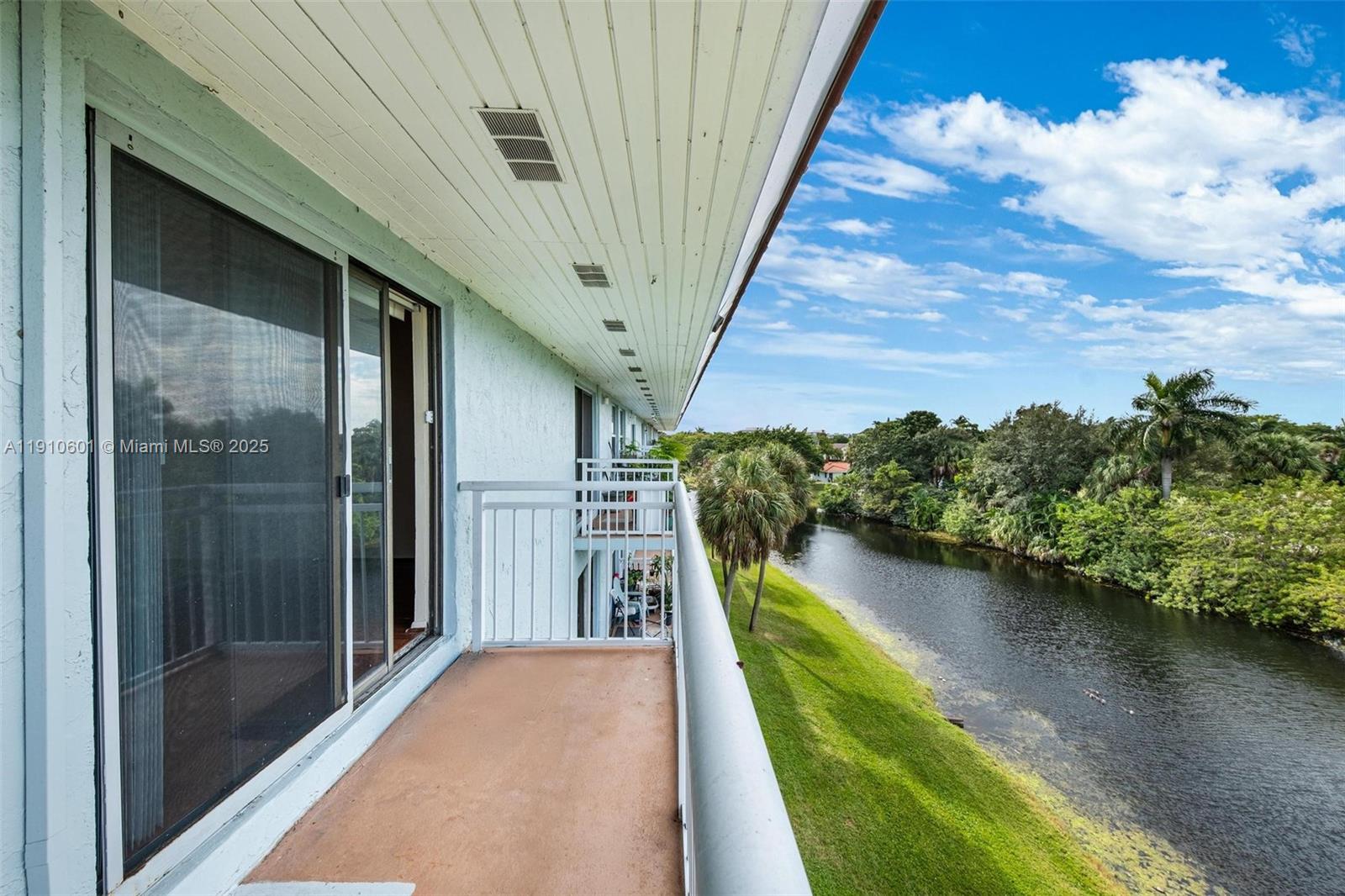 405 South Pine Island Road, Unit 405D Plantation, FL 33324 - Photo 2 of 28 a view of a balcony with hardwood