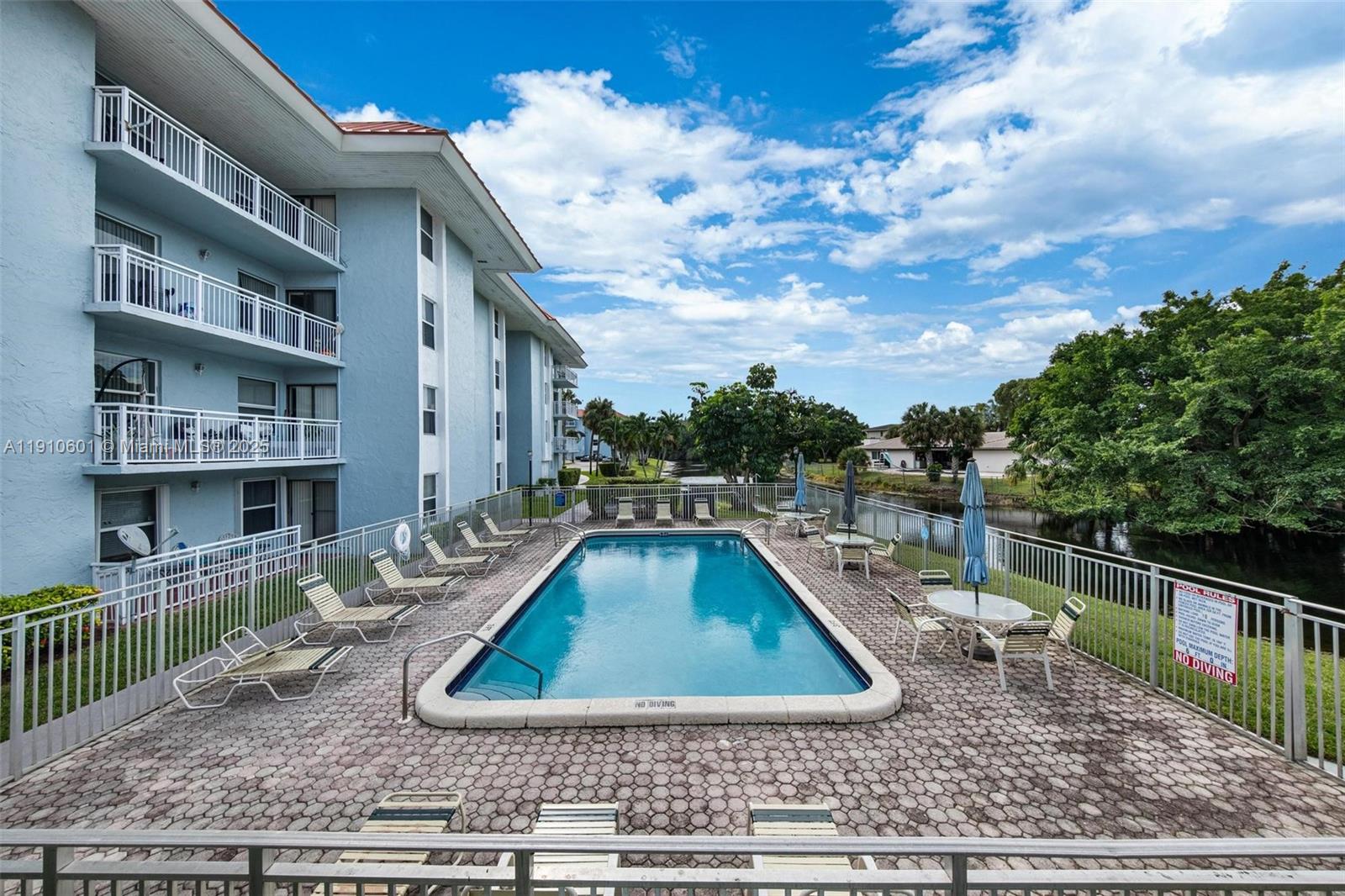 405 South Pine Island Road, Unit 405D Plantation, FL 33324 - Photo 28 of 28 a view of a house with pool